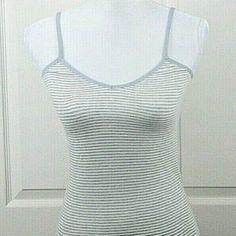 The Limited Women's Spaghetti Strap Top Size M Gray White Striped Cami Nwt (Sl19) Wear Two Ways: V-Neck Or Scoop Neck. Approximate Measurements: Chest (Armpit To Armpit) 13½” Length (Top Of Shoulder Strap To Bottom Hem) 24” Made Of 60% Cotton And 40% Nylon. Please Review The Pictures. Be Sure To Check Out Our Closet For Other Great Items. Fitted Striped Tank Top With Spaghetti Straps, Fitted Gray Summer Camisole, Striped Fitted Tops With Tank Straps, Fitted Striped Tops With Tank Straps, Striped Fitted Tank Top With Tank Straps, Gray Fitted Spaghetti Strap Tank Top, Fitted Gray Spaghetti Strap Tank Top, Gray Spaghetti Strap Camisole, Gray Spaghetti Strap Casual Camisole