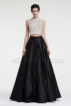 The two pieces prom dress features halter neckline, white top with crystals and beadings, black ball gown skirt finishing with floor length. Sparkly Ball Gown, Two Piece Prom Dress, Two Piece Prom, Black Ball Gown, Best Prom Dresses, Black Two Piece, Ball Gown Skirt, Beaded Prom Dress, Backless Prom Dresses