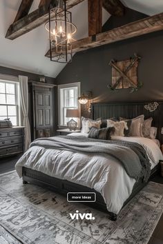 a large bed sitting in the middle of a bedroom next to a dresser and window