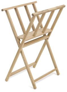 a wooden folding chair on a white background