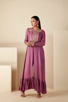 Embrace regal elegance with our Mauve Majesty Zardosi Kurta Set. Adorned with exquisite hand-embroidered zardosi, this set pairs a detailed kurta with sleek slim-fit pants for a modern twist. The luxurious georgette crepe and Tussar silk blend, in a delicate mauve, ensure a graceful drape with a comfortable fit. Embroidered Raw Silk Palazzo Set For Reception, Designer Georgette Anarkali Set With Front Open, Designer Resham Embroidered Front-open Anarkali Set, Designer Front Open Georgette Anarkali Set, Traditional Front Open Sharara With Resham Embroidery, Diwali Anarkali Set With Resham Embroidery And Front Open, Front Open Georgette Anarkali Set With Zari Work, Designer Semi-stitched Front Open Anarkali Set, Designer Wear Front Open Salwar Kameez With Zari Work