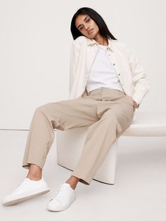 Reach for these pants when your schedule calls for all-day comfort—we kept the silhouette casual, adding a concealed elastic waistband at back for a custom fit.  Here, we cut this pant in a luxuriously soft, buttery feeling blend of TENCEL™ lyocell and organic cotton.  Relaxed Tapered fit: High rise (11") with a relaxed fit through the thigh and tapered leg.  Ankle length.  Sustainability: Made with certified organic cotton and TENCEL™ lyocell, a sustainably sourced fiber from responsibly-harves Look Put Together, Party Sale, Twill Pants, Pair Of Pants, Sales Gifts, Custom Fit, Ankle Length, Banana Republic, Sustainability