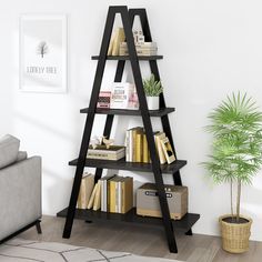 a bookshelf in the corner of a room with a couch and potted plant