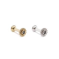 A beautiful flat back stud earring to add to your cartilage. With an abstract floral design, this unique stud is crafted from 14k solid gold and prong set with a round-cut black diamond totaling 0.01 carats. It's minimalist and totally chic. You'll love wearing it!The threaded screw pin earring post is easy to insert and remove, and the flat back makes it comfortable to wear. Our screw pin flat back earring studs are made of solid 14k gold and are hypoallergenic and nickel free.Materials:• 14k s Elegant Round Screw Back Piercings, Elegant Round Piercings With Screw Back, Daith Jewelry, Tragus Hoop, Helix Jewelry, Unique Studs, Abstract Floral Design, Tragus Jewelry, Labret Studs