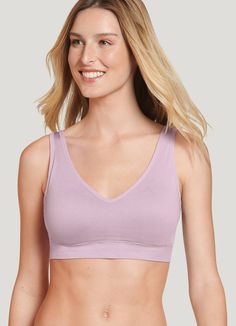 The Jockey® Molded Cup Seamfree Bralette has everything you want in a bra and more: Soft, sewn-in, wire-free molded cups to enhance your natural shape. (Bonus: no pads to remove for washing!) Extra back and side smoothing for a sleek fit under your favorite tops. Wide, hardware-free straps and underband lend comfortable support with no pinching or digging. Silky, stretchy, breath-ahh-ble knit fabric. Perfect coverage and comfort it s the bra(lette) you ll wear all day, every day! | Jockey® Molde Stretch Sports Bra With Soft Touch For Relaxation, Comfortable Stretch Tops Bra Friendly, Fitted Full Coverage Top With Soft Touch, Full Coverage Fitted Top With Soft Touch, Fitted Tops With Soft Touch, Soft Touch Stretch Tops For Relaxation, Seamless Full Coverage Tops For Loungewear, Seamless Full Coverage Loungewear Tops, Stretch Bra With Soft Touch