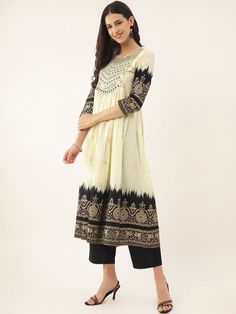 Size: Please Check the last image above for a complete size chart. Cream-coloured, black & gold-toned embroidered Kurta with Palazzos with dupattaKurta design: Ethnic motifs embroidered Straight shape Empire style Round neck, three-quarter regular sleeves Na pockets thread work detail Calf length length with straight hem Pure cotton machine weave fabric Palazzos design: Solid Palazzos Elasticated waistband Slip-on closure Material & Care Kurta Fabric:Pure CottonBottom Fabric:Viscose RayonDupatta