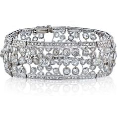 Crafted with exquisite detail in the 1940s, our Circa 1940's Platinum 35 Carat Old Cut Diamond Openwork Bracelet captures the timeless elegance of a bygone era. This captivating piece is a true testament to the craftsmanship of the past, featuring a stunning openwork design adorned with 316 old cut diamonds.Every diamond in this bracelet has been carefully selected for its exceptional quality and brilliance. With a total carat weight of 35 carats, these diamonds sparkle with a captivating radian Platinum Metal, Designer Jewellery, Vintage Glamour, Metal Bracelets, Estate Jewelry, Vintage Charms, Bracelet Set, Timeless Beauty, Types Of Metal