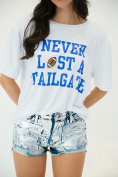 NEVER LOST A TAILGATE SHORT SLEEVE TEE gameday23 Judith March SMALL Football Fans, Winter Wear, Sunnies, Short Sleeve Tee, Winter Fashion, Blue Color, Cool Designs, Autumn Fashion, Blue