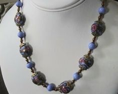 "Gorgeous, authentic Murano, vintage Venetian \"wedding cake\" glass bead handmade necklace with blue, pink, and aventurine flecked gold glass from Murano, Italy, 1970s. Beautiful blue beads of different shapes, with pink rose flowers and gold aventurine flecks threaded through the design of the large beads, alternating with smaller solid blue glass beads and gold-fill and brass spacer beads. Vintage Italian glass artistry from the 70s. A wonderful \"something blue\" for a bride, a perfect weddi Vintage Czech Glass Necklace With Polished Beads, Vintage Czech Glass Polished Beads Necklace, Vintage Glass Necklaces With Oval Beads, Vintage Czech Glass Necklaces With Polished Beads, Vintage Necklace With Polished Beads, Vintage Jewelry With Bead Caps And Round Beads, Vintage Czech Glass Oval Beaded Necklace, Vintage Czech Glass Beaded Necklace With Round Beads, Vintage Style Czech Glass Beaded Necklace