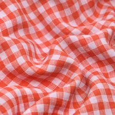 an orange and white checkered fabric