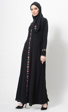 Featuring an elegant A line silhouette long flowy abaya dress in nida fabric adorned with multicolor floral embroidery at the centre front and sleeves. It has round neckline and princess seams for the comfortable wear causally.FIT : Relaxed fit.COMPOSITION : Nida.CARE : Dry clean only. Flowy Abaya, Embroidered Abaya, A Line Silhouette, Line Silhouette, Abaya Designs, Abaya Dress, Embroidery Fashion, Embroidered Jacket, Princess Seams