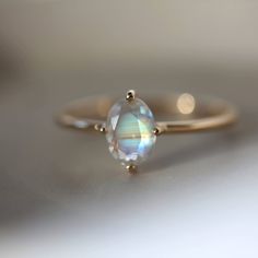 Oval Cut Moonstone Ring, 14k Rose Gold Ring, Rainbow Moonstone Promise Ring  Moonstone Engagement Ring  June Birthstone Ring Moonstone Ring Maine Stone - Natural Moonstone  Stone Shape - Oval Stone Color - Blue Fire  Stone Size - 7x6 MM Birthstone - June Features: * Handmade * Ready To Ship * Center Stone Pearl * Brand New * All Ring Sizes Available * Suitable For Every Day * 14k Solid Gold / 18k Solid Gold / Gold Filled Over Sterling Silver * Purity Stamped * Fits True to Size * High Quality * Engagement Ring Oval Cut, June Birthstone Ring, Beach Shower, Engagement Ring Oval, Ring Moonstone, Moonstone Engagement, Moonstone Engagement Ring, Moonstone Stone, Etsy Gold Ring