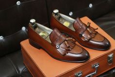 Step into refined style with these Handmade Pure Tan Leather Stylish Loafer Shoes for Men. Meticulously crafted with precision and care, these loafers are a testament to sophistication and elegance. The pure tan leather exudes warmth and versatility, making them perfect for any occasion. Whether you're dressing up for a formal event or seeking to add a touch of luxury to your everyday look, these handmade loafers are sure to impress. Step into comfort and style with these exquisite leather loafers, the perfect addition to any wardrobe. Brown Slip-on Moccasins With Tassels, Business Leather Oxfords With Tassels, Formal Brown Dress Shoes With Tassels, Brown Tasseled Leather Shoes For Galas, Brown Leather Tassel Shoes For Galas, Brown Tassel Dress Shoes For Galas, Brown Tasseled Moccasins For Galas, Brown Tasseled Dress Shoes For Galas, Brown Wingtip Loafers With Tassels