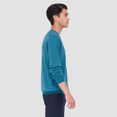 The Scott crew neck sweater in 100% extra-fine Merino wool with Harmony 4.0 special finish is made in Italy and features a ribbed neckline, sleeve cuffs and waistband. This sweater is made with a high-twist yarn that's breathable, moisture-wicking, water repellent, machine-washable, and crease-proof for long lasting performance wash after wash. Cashmere Tops With Ribbed Crew Neck, Cashmere Tops With Ribbed Collar And Crew Neck, Cashmere Top With Ribbed Crew Neckline, Modern Winter Sweater With Ribbed Neckline, Blue Crew Sweater With Ribbed Neckline, Crew Neck Sweater With Ribbed Waistband And Relaxed Fit, Cashmere Tops With Ribbed Cuffs For Loungewear, Crew Neck Cashmere Sweatshirt With Ribbed Cuffs, Modern Cashmere Crew Neck Sweater