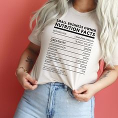 "Rock your entrepreneurial spirit with our \"Small Business Owner Nutritional Facts\" graphic tee by Bella Canvas. This clever design is both a humorous play on product nutritional labels and a true reflection of the daily life and dedication of a small business owner. Whether you're the proud founder of a startup, a dedicated CEO, or hunting for the perfect gift for an entrepreneurial friend, this shirt resonates with the challenges, joys, and humor of the business world. Product Features: Brand: Authentic Bella Canvas - the epitome of comfort and durability. Design: Exclusive \"Small Business Owner Nutritional Facts\" graphic - wear your business journey with a twist of humor. Style:Modern unisex fit - perfect for visionary leaders of all genders! Gift Potential:An outstanding gift for n Women Entrepreneur Shirt, Cute Cricut Shirts Business, Small Business Tshirt Printing, Minding My Own Small Business Shirt, Nail Tech Humor, Business Owner Shirts, Small Business Shirt, Business Owner Gifts, New Business Owner