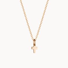 A timeless classic to treasure each day, our Mini Cross Charm Necklace is perfect for commemorating those special moments. Gift to a loved one or cherish your new favorite necklace in either 18K Champagne Gold Plated or 925 Sterling Silver.&nbsp;18K Champagne Gold Plated or 925 Sterling SilverMini Cross: 0.3 x 0.2Charms are removable from this chain and can be worn on all Merci Maman chain lengthsSent with love in a complimentary gift box Cross Charm Necklace, Mini Cross, Cross Charms, Champagne Gold, Special Moments, Each Day, Timeless Classic, Chain Styles, Gift Bag