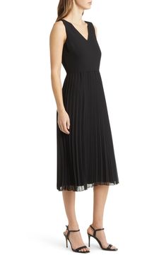 Designed in a sleeveless silhouette, this day-to-night dress is punctuated with a pleated chiffon skirt. 46" length (size 8) V-neck Sleeveless Lined 100% polyester Dry clean Imported Elegant Chiffon A-line Pleated Dress, Black Sleeveless Dress With Accordion Pleats, Sleeveless Chiffon Pleated Dress For Party, Sleeveless Chiffon Pleated Party Dress, Chic Pleated Chiffon Dress With Pleated Bodice, Chic Chiffon Pleated Dress With Pleated Bodice, Sleeveless Pleated Back Dress For Formal, Sleeveless Dress With Accordion Pleats For Evening, Sleeveless Dresses With Pleated Back For Formal Events