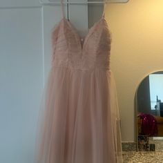 Light Pink Tulle Party Dress. Mid Length With Zipper Accent On Back. Size 1. Never Worn Tulle Mini Evening Dress For Party, Mini Length Tulle Evening Party Dress, Mini Tulle Evening Dress For Party, Spring Homecoming Dresses With Lined Bodice, Sleeveless Tutu Bridesmaid Dress For Prom Season, Sleeveless Tutu Bridesmaid Dress For Prom, Tulle Dress With Sweetheart Neckline For Party, Tulle Party Dress With Sweetheart Neckline, Party Dress With Sweetheart Neckline In Tulle