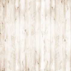 a white wooden wall with planks in the middle