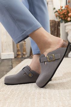 Exude casual-cool style in comfort in these slip-on-and-go clogs, crafted from a soft suede in a versatile neutral hue for effortless pairing. A durable TPU sole ensures tread-safe steps. Suede upper Man-made leather lining Man-made insole TPU sole Reindeer Headband, Classic Grey, Grey Crewneck, Dress Jewelry, Clogs Shoes, Soft Suede, Boot Shop, Heeled Mules, Clothing Items