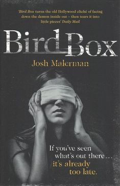 a book cover with a woman covering her eyes and the title bird box on it