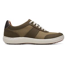 These leather lace-up sneaks aren't just another pair of sneaks. They're meant to be worn around town as you show off their sleek silhouette. From Clarks Footwear. Modern Low-top Sneakers For Fall, Modern Lace-up Sneakers For Fall, Spring Sneakers With Stitched Sole For Everyday, Casual Leather Golf Shoes With White Sole, Fall Low-top Sneakers With Rubber Sole, Casual Low-top Walking Shoes With Laces, Sporty Sneakers With Perforated Toe Box For Fall, Modern Fall Sneakers With Rubber Sole, Walking Sneakers With Rubber Sole For Fall