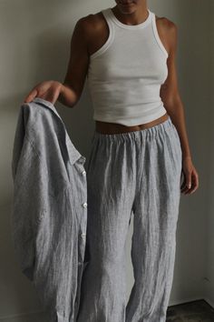 Experience effortless style with our new Patricia Linen Pant. Our premium linen fabric offers a lightweight and soft texture, perfect for every season. The simple elastic waistline and functional side pockets make this pant a versatile choice - wear it high on your waist for a tailored look or lower on your hips for a relaxed vibe. Coordinate with our Arlo Top for a timeless outfit.Made in USA Relaxed Linen Wide Leg Pants For Daywear, Casual Linen Bottoms For Daywear, Linen Pants With Straight Hem For Daywear, Versatile Linen Bottoms, Everyday Straight Summer Pants, Relaxed Trousers For Everyday, Everyday Summer Straight Pants, Daywear Linen Pants With Elastic Waistband, Linen Pants With Elastic Waistband For Daywear