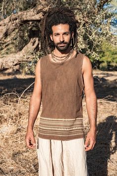 ❂ Walnut dyed brown hemp cotton tank top with tribal print . soft and earthy ❂⫸⫸ SIZE ⫸⫸S, M, L and XLPlease check the sizing chart in the last picture⫸⫸ MATERIALS ⫸⫸We focus on natural materials and aim to support traditional crafts and ancient skills ~striving to go deeper to the source of all materialsOur vision is to be able to connect with each being involved in the making from the very source,Being able to Source the most ethical, fair trade, Eco and conscious materials ⫸⫸ COLOR ⫸⫸❀ Please Casual Cotton Tank Top For Festivals, Casual Brown Tank Top For Festival, Hippie Cotton Tank Top, Hippie Style Summer Festival Tank Top, Brown Sleeveless Top For Festival, Bohemian Cotton Tank Top For Summer, Brown Sleeveless Hippie Top, Summer Festival Hippie Tank Top, Sleeveless Brown Top For Festival