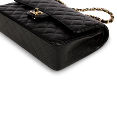 It's true when they say that legends never die, at least in Chanel's case when it comes to their iconic Classic Flap bags. One of the most acclaimed and desired bags in history, the Chanel Classic Flap is the ultimate must-have for any woman with a love for luxury - seriously, no handbag collection is complete without one. Presented in the brand’s signature caviar leather and complimented by Gold-tone hardware, the Medium Classic Flap embodies the definition of elegance and timeless femininity. A bag that will never go out of style, this investment piece is a purchase you won't regret. The CF is a bag you can pass on to your daughter, who will pass it down to her daughter, and so forth - it's no wonder the Classic Flap is, well, a classic. SPL Exterior Black caviar leather Gold tone hardwa Luxury Double Flap Bag For Travel, Luxury Double Flap Travel Bag, Luxury Double Flap Bag, Classic Rectangular Flap Bag For Everyday Luxury, Double Flap Satchel For Everyday Use, Luxury Double Flap Business Bags, Luxury Business Shoulder Bag With Double Flap, High-end Double Flap Shoulder Bag For Travel, Timeless Evening Bag With Double Flap