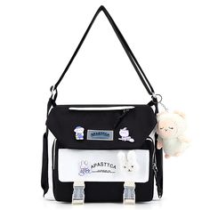 PRICES MAY VARY. 【HIGH QUALITY MATERIAL】 The kawaii shoulder bag is made of high-quality nylon fabric, which is wear-resistant and good in texture, durable to use. 【LARGE CAPACITY】 Size:12.6x11x4.3in. The storage space of this kawaii messenger bag is big enough for your daily belongings. You can easily take your iPad, cell phone, book, wallet, makeup, etc. with you. 【KAWAII ACCESSORIES】Comes with kawaii pins and stuffed pendant. You can also DIY the cute crossbody bag with other kawaii accessori White Harajuku Style Canvas Bag For School, Harajuku Style White Canvas Bag For School, Harajuku Style Large Capacity School Bag, Harajuku Style Crossbody Shoulder Bag For Daily Use, White Harajuku Satchel For Everyday Use, Harajuku Style Large Capacity White Shoulder Bag, White Harajuku Shoulder Bag With Large Capacity, White Harajuku Style Shoulder Bag With Large Capacity, Kawaii Backpack Shoulder Bag For Students