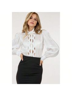 Elevate your wardrobe with our Insert Lace Trim Long Sleeve Blouse, a delightful combination of elegance and comfort. This airy and lightweight button-down blouse is adorned with delicate lace trim detailing, adding a touch of sophistication to your ensemble.

Key Features:
1. Fabric: Indulge in the luxurious feel of our Insert Lace Trim Long Sleeve Blouse, crafted with 100% Polyester for a soft and lightweight experience.
2. Fit: Embrace the airy and comfortable design of this blouse, ensuring Elegant Lace Top For Workwear, Elegant Long Sleeve Lace Top For Formal Occasions, Elegant Solid Tops For Daywear, Elegant Solid Color Tops For Daywear, Elegant Spring Lace Top For Daywear, Elegant Lace Top For Spring Daywear, Formal Long Sleeve Blouse With Lace Trim, Button-up Blouse With Lace Trim For Work, Chic Lace Top Button-up Blouse