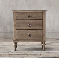 an old wooden dresser with three drawers on one side and two knobs on the other