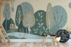 a child's room with a mural on the wall and wooden ladders in front of it