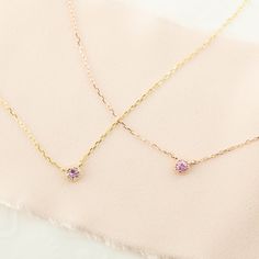 "Give this genuine birthstone stone necklace to celebrate the special month. * Stone size: ≈3mm * Setting size: ≈4.3mm * 16~18\" adjustable chain * Solid 14k yellow gold is in stock * 14k rose gold and white gold available for custom order * Made of 100% recycled precious metal and ethically sourced gemstone * Comes in a gift box with a bow ready for gifting * Handmade with love and great care in New York ~~Birthstone~~ January -Rhodlite Garnet February -Amethyst March -Aquamarine April -Diamond 14k Gold Birthstone Necklace With Round Stone, Gold Dainty Birthstone Necklace With Round Stone, Dainty Gold Birthstone Necklace With Round Stone, Elegant Yellow Gold Birthstone Necklace For Birthday, Delicate Yellow Gold Round Birthstone Necklace, May Birthstone Yellow Gold Necklace With Round Stone, Yellow Gold Birthstone Necklace For May With Round Stone, Yellow Gold Birthstone Necklace With Round Stone For May, Dainty Yellow Gold Birthstone Necklace With Round Stone