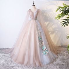 Flower Ball Gown Fairytale Fashion, Prom Season Tulle Gown With Lace Bodice, Tulle Gown With Lace Bodice For Prom Season, Tulle Gown With Lace Bodice For Prom, Tulle Ball Gown For Quinceanera During Prom Season, Tulle Ball Gown For Debutante Ball And Prom Season, Prom Evening Dress With Lace Bodice And Tulle, Spring Tulle Evening Dress With Sweep Train, Spring Tulle Ball Gown For Banquets