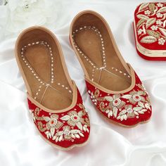 Red Gold Punjabi Jutti/Slipper Studed with fine Zardozi Wrok. Matching Clutch Available. Available in sizes: 27, 38, 39 We try to take pictures as normal as we can but Colors may vary due to light setup. Party Heels With Zari Work, Festive Wedding Heels With Round Toe, Red Closed Toe Wedding Shoes For Summer, Flat Wedding Shoes For Reception, Flat Wedding Shoes For Receptions And Festivals, Traditional Summer Wedding Shoes, Traditional Round Toe Party Heels, Festive Gota Work Heels For Wedding, Traditional Round Toe Heels For Party