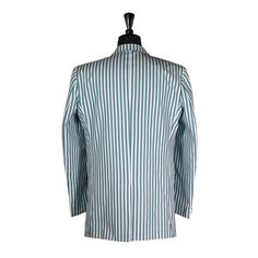 This Chiragh Apparel blazer is an elegant upgrade on dapper tailoring and features rich shades in a sumptuous fabric for elegant opulence. Fashioned from premium a quality cotton blend, this striped blazer features full lining in Japanese silk, a notch lapel, two-button closure and single-vented back. A left chest pocket and three flap pockets appoint the front while the inside has two (2) pockets on the left and one (1) pocket on the right. A flash of contrast piping is added to the jacket lini Semi-formal Custom Fit Single Button Blazer, Custom Fit Tuxedo Blazer With Notch Lapel, Semi-formal Custom Fit Blazer With Suit Collar, Custom Fit Blazer With Suit Collar For Semi-formal Occasions, Semi-formal Blazer With Suit Collar, Spring Wedding Tailored Double Breasted Suit, Spring Wedding Double Breasted Tailored Suit, Classic Fitted Nehru Jacket For Groom, Wedding Suits With Welt Pockets And Lapel Collar