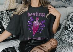 "Pink Potion Destiny is waiting T-shirt, Witchcraft Witch Spell Shirt for Women, Halloween Gift Top for Her, Comfort Colors Oversized Tee. SIZE UP 2-3X FOR AN OVERSIZED LOOK - - - PLEASE LOOK AT THE SIZE CHART Part of our ZODIAC Collection, the SCORPIO Unisex Shirt can be dressed up or down to fit your aesthetic. It's the perfect shirt for anyone born from OCTOBER 23 to NOVEMBER 22. Made from 100% organic ring-spun cotton, this unisex t-shirt is a total must-have. It's high-quality, super comfy, and best of all--eco-friendly. Size up 2-3x your regular size for an oversized look. Please read the size chart to see the corresponding sizes. Looking for a different zodiac shirt? Click here:  https://www.etsy.com/shop/WhimsicalAvenu?section_id=42619191 FABRIC DETAILS❤️ This is a \"Comfort Colors Warlock Shirt, Zodiac Shirts, Oversized Tee, Perfect Shirt, Dye T Shirt, Unisex Shirt, Destiny, Halloween Gifts, Comfort Colors