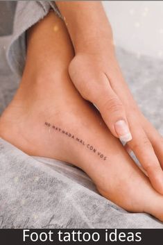 As summer approaches, many people will show more skin, which also means showing off their foot tattoo ideas! A popular place on the body, especially smaller foot tattoo ideas. What’s better to add a friendly new ink to your feet when you throw the words, the days of the beach, and the season of the bathtub? There are many ways to make a small foot tattoo creative! Whether someone plans to wear high heels all summer or not at all for most of the hot days, Feet Ankle Tattoos, Arch Of Foot Tattoo, Ankle Text Tattoo, Tattoo Ideas Female Writing, Bottom Foot Tattoo, Fine Line Feet Tattoos, Word Ankle Tattoo, Top Foot Tattoos For Women, Inside Of Foot Tattoo