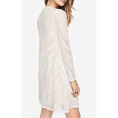 Our must-have long-sleeve dress in geometric lace falls for a semi-relaxed fit and has some stretch for all-day ease. Its semi-sheer effect is pared down with its jersey lining through the body.PulloverGeometric patchwork laceFabric: 95% nylon, 5% spandex lace; lining: 92% polyester, 8% spandex jerseyWashable, dry clean recommendedMid-weight, stretch fabricKnee-length hemlineTrue to fitModel is approximately 5'9” Fitted Crochet Dress With Lace Long Sleeves, Chic Long-sleeved Lace Crochet Dress, Chic Long Sleeve Crochet Lace Dress, Chic Long Sleeve Lace Crochet Dress, Chic Long Sleeve Crochet Dress With Lace Trim, Chic Crochet Dress With Lace Trim And Long Sleeves, Bohemian Long Sleeve Sheer Dress, Elegant Long Sleeve Crochet Dress For Spring, Spring Long Sleeve Crochet Lace Dress