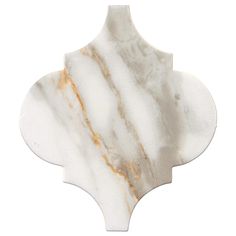 a white marble flower shaped object with gold veining on the top and bottom, against a white background