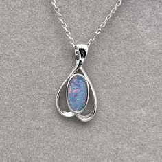 925 Sterling Silver Natural Australian Boulder Opal Doublet Pendant Necklace | October Birthstone | Fine Gemstone Jewelry | Gift Jewelry Opal is the queen of gemstone, which is one of the most beautiful gemstones in the world. Every piece of opal is unique. Its optical effect is Play-of-Color, which shows a vivid play of iridescent color. The colors change when the stone is viewed with various angles. We only use natural opal (no synthetics) for our jewelry. This elegant pendant necklace is simp Elegant Oval Silver Birthstone Necklace, Oval Pendant Necklaces, Sterling Silver Birthstone Necklace With Oval Pendant, Elegant Sterling Silver Necklaces With Stone Setting, Silver Birthstone Gemstones, Sterling Silver Teardrop Jewelry With Stone Setting, Sterling Silver Cabochon Necklace For Anniversary, Formal Sterling Silver Birthstone Gemstone Necklace, Elegant Oval Birthstone Necklace In Sterling Silver