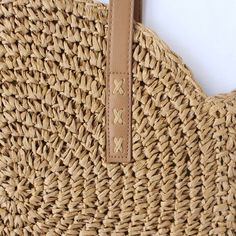 Introducing our Round Straw Bag - the epitome of summer chic and beach vibes. This rattan beach tote bag, also known as the Bali Bag, is the perfect accessory to elevate your style and bring a touch of bohemian charm to any outfit. Shape and Style: The bag's round shape adds a unique and trendy element to your look, making it a standout piece wherever you go. Its boho-inspired design is perfect for beach days, vacations, or casual outings, giving you that relaxed and carefree feel. Versatile Sho Bohemian Beige Straw Bag Made Of Rattan, Bohemian Beach Bag For Everyday Spring Use, Bohemian Straw Tote Bag For Vacation, Bohemian Beach Bag In Natural Fiber For Vacation, Trendy Rattan Beach Bag With Braided Handles, Bohemian Straw Bag For Everyday Summer Use, Bohemian Summer Bags In Natural Color, Brown Summer Straw Bag For Beach, Bohemian Beige Straw Bag For Vacation