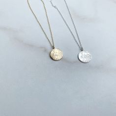 An incredible full moon is etched on either a brass or sterling silver pendant and hangs from a delicate chain. Chain available in sterling silver or 14k gold fill. This tiny moon pendant measures 12mm in diameter and has a little loop soldered on top. The pendant will move on the chain, but will not come off. This is the perfect little pendant to wear alone or layer up with other necklaces. Each pendant is unique and handmade, one at a time. Please allow for slight variations in your piece from Minimalist Etched Round Pendant Necklace, Dainty Engraved Round Pendant Coin Necklace, White Gold Etched Round Pendant Necklace, Etched White Gold Round Pendant Necklace, Sterling Silver Moon Engraved Necklace, Dainty Sterling Silver Medallion Coin Necklace, Sterling Silver Moon Shaped Engraved Necklace, Everyday Etched Pendant Necklace, Minimalist Round Etched Necklace