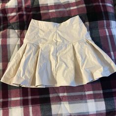 Xs Brand New Never Worn Cream Tennis Skirt Cream Colored Skirt, Beige Stretch Mini Skirt For Summer, Summer Stretch Beige Skirt, Beige Stretch Skort For Summer, Stretch Beige Pleated Mini Skirt, Beige Stretch Pleated Mini Skirt, Fitted Beige Summer Skirt, Beige Stretch Cotton Mini Skirt, Beige Mini Skort For Summer