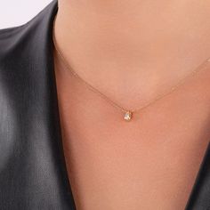 ✦ Floating Diamond Necklace ✦  This is a classic, through and through and we wouldn't want it any other way. The necklace is made of 100% 14k solid gold with a round-cut ethically sourced diamond in a bezel setting. A piece you can hold on to forever. ❶ Made in 14k Solid Gold. ❷ Set with handpicked top-quality Diamonds. Clarity: SI1 Color: F - G ❸ Adjustable length: 16 to 18 inches. ❹ Diamond: 3.00mm. 0.10ct. F-G SI1 ❺ Charm diameter:5.00mm x 3.50mm ✧ MATERIALS - 14k Solid Gold Our 14k solid gol Classic Solitaire Necklace With Delicate Chain For Anniversary, Classic Diamond Necklace With Delicate Chain For Anniversary, Classic Solitaire Necklace With Delicate Chain, Classic Diamond Necklace With Delicate Chain Gift, Timeless Formal Solitaire Necklace With Delicate Chain, Classic Jewelry With Delicate Chain And Round Cut, Minimalist Single Diamond Jewelry For Formal Events, Elegant Diamond White Necklaces For Everyday, Classic Single Diamond Necklace For Formal Events