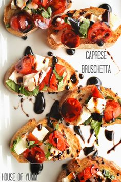 three slices of bread topped with tomatoes, cheese and black olives