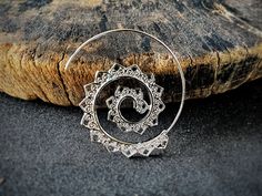 These unique bohemian spiral silver earrings dangle will be a must-have in your wardrobe. Large earring design, silver painted stainless steel material, hypoallergenic Length: 1.5 inches Width: 1.5 inch Unique handmade earrings, you can wear it on any occasion: Dating, Party, Beach, Christmas,... It is also a meaningful gift for friends, colleagues, family... Processing time:  3-4 business days Shipping time: - USA: 4-6 business days On average, about 8-10 business days you will receive your order !! Each item is handmade, so its appearance may vary slightly from the product images. Colors may differ slightly due to computer monitor screen settings. !! For the best jewelry preservation, avoid wearing them while bathing, swimming, or exercising hard. Love them as your friend !! Click here t Spiral Ear Wire Earrings For Festival, Silver Hippie Dangle Jewelry, Hippie Silver Dangle Jewelry, Spiral Earrings For Festivals, Pierced Ears, Handmade Bohemian Swirl Earrings, Spiral Earrings For Festivals, Silver Spiral Hoop Earrings, Unique Spiral Jewelry For Festivals, Bohemian Spiral Hoop Earrings For Pierced Ears