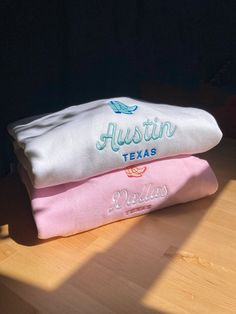 Dallas/Texas/Austin/Fort Worth Customizable Embroidered Crewneck  Embroidered on 50/50 cotton/polyester blend sweatshirts.  Need something custom? Need it by a certian date? We'd love to help! Please send us a message BEFORE placing your order. 📜 RETURN POLICY:WE DO NOT ACCEPT RETURNS OR EXCHANGES. Please consider this before purchasing. For more details, please read our shop policies.  👕 SIZING: *Sweaters are UNISEX fit. Sweatshirts fit true to size. Some garments are pre-shrunk but may shrin Pink Crew Sweatshirt With Embroidered Graphics, College Cotton Sweater With Embroidered Graphics, College Embroidered Fleece Top, Pink Long Sleeve Hoodie With Embroidered Text, Cotton College Sweater With Embroidered Graphics, College Cotton Hoodie Sweater, Embroidered Fleece Tops For College, Cotton Hoodie Sweater For College, Pink Embroidered Tops For College