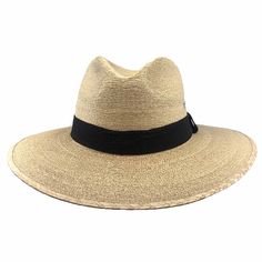 Natural tripilla palm sun hat for men and women. Tight micro-braided palm strands provide excellent sun protection. Shallow crow, 3.75" with deep center dent and front pinch. Slight front to back curve brim, 3.25". Black band. Triple metal grommets on each side for ventilation. Elastic inner comfort band. UPF 50+ sun protection hat. 100% palm fiber. Product of Mexico. Adjustable Wide Brim Toquilla Straw Hat, Adjustable Coastal Straw Hat Made Of Toquilla, Adjustable Short Brim Panama Hat In Palm Leaf, Adjustable Short Brim Panama Hat, Adjustable Wide Brim Panama Hat In Palm Leaf, Adjustable Palm Leaf Hats With Flat Brim, Adjustable Flat Brim Palm Leaf Hat, Adjustable Palm Leaf Hat With Flat Brim, Adjustable Panama Hat With Short Brim